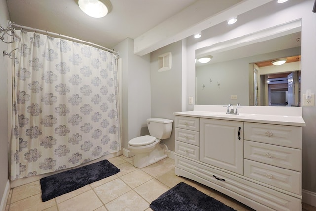 1 Tupperware Dr Unit 121, North Smithfield, RI 02896 - full bathroom featuring vanity, toilet, tile patterned flooring, and baseboards
