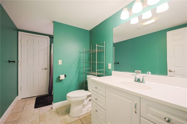 1 Tupperware Dr Unit 121, North Smithfield, RI 02896 - bathroom with baseboards, vanity, toilet, and tile patterned flooring