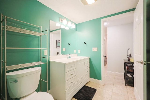 1 Tupperware Dr Unit 121, North Smithfield, RI 02896 - bathroom featuring vanity, tile patterned flooring, toilet, and baseboards