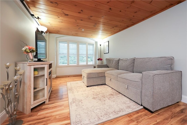1 Tupperware Dr Unit 121, North Smithfield, RI 02896 - living area featuring lofted ceiling, wooden ceiling, light wood-style floors, and baseboards