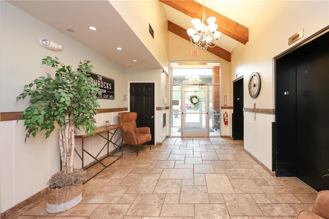 1 Tupperware Dr Unit 121, North Smithfield, RI 02896 - entrance foyer with a chandelier, stone tile floors, beamed ceiling, recessed lighting, and high vaulted ceiling