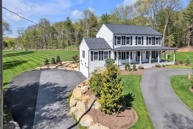 117 Mann School Rd, Smithfield, RI 02917 - view of front of property featuring asphalt driveway, covered porch, roof with shingles, a front yard, and a garage