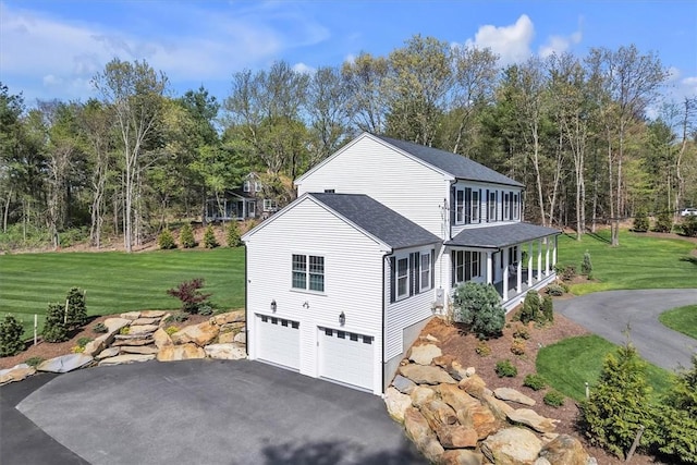 117 Mann School Rd, Smithfield, RI 02917 - view of property exterior with driveway, an attached garage, a lawn, and a shingled roof