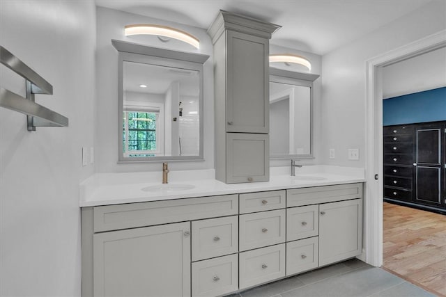 117 Mann School Rd, Smithfield, RI 02917 - full bathroom with double vanity and tile patterned flooring
