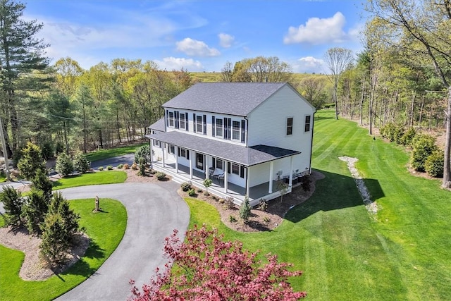 117 Mann School Rd, Smithfield, RI 02917 - view of front of home with covered porch, a shingled roof, a front yard, and asphalt driveway