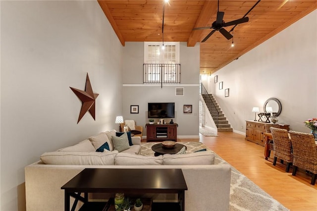 1 Tupperware Dr Unit 226, North Smithfield, RI 02896 - living area with wood ceiling, a ceiling fan, stairs, and wood finished floors