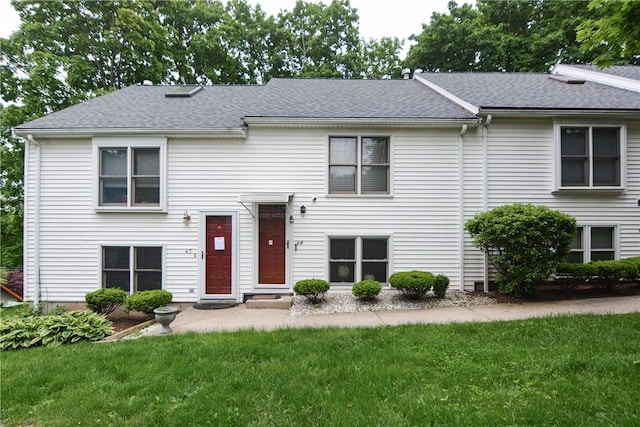 10 Leach St Unit B4, Cumberland, RI 02864 - view of front facade with a front yard and a shingled roof