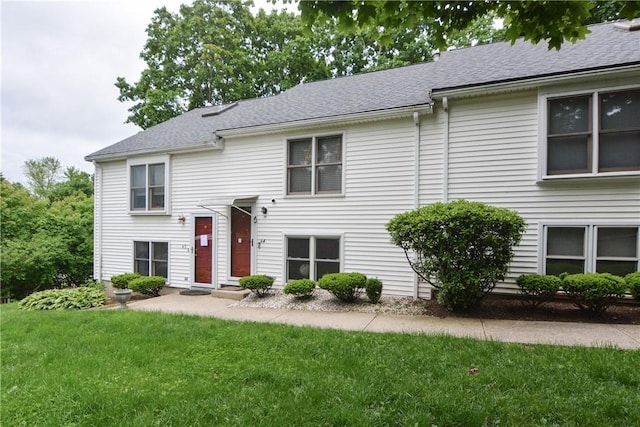10 Leach St Unit B4, Cumberland, RI 02864 - view of front of home featuring a front lawn and a shingled roof