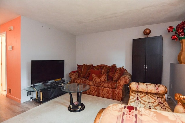 10 Leach St Unit B4, Cumberland, RI 02864 - living area featuring wood finished floors and baseboards