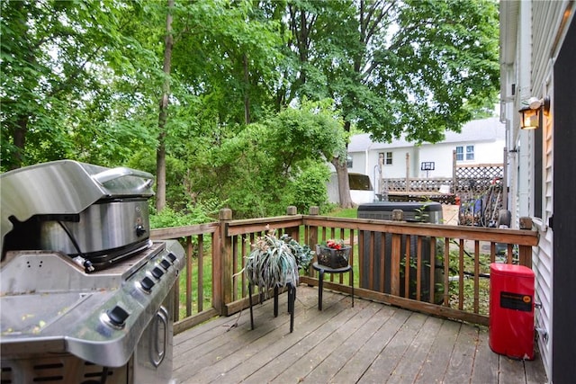 10 Leach St Unit B4, Cumberland, RI 02864 - wooden deck featuring a grill