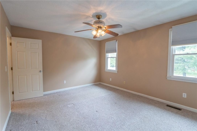 26 Noel Ct, South Kingstown, RI 02879 - carpeted spare room featuring ceiling fan and baseboards