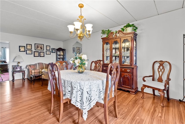 510 Child St Unit 105B, Warren, RI 02885 - dining space featuring a chandelier and light wood-style floors