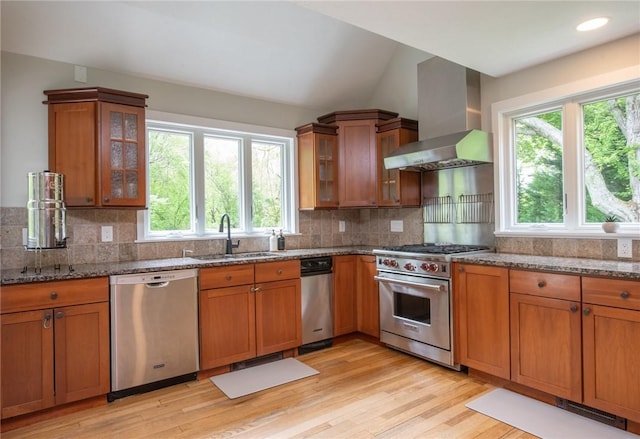 200 Miner Rd, North Kingstown, RI 02874 - kitchen with stainless steel appliances, wall chimney range hood, and brown cabinets
