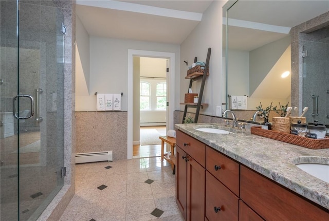 200 Miner Rd, North Kingstown, RI 02874 - bathroom featuring baseboard heating, double vanity, a stall shower, and a baseboard radiator