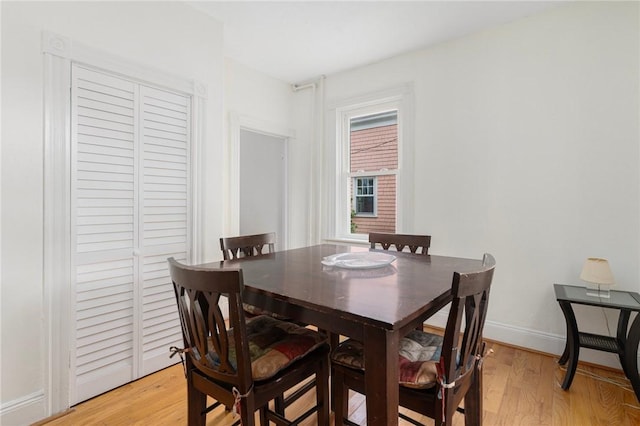 53 Warner St, Newport, RI 02840 - dining space with light wood-style floors and baseboards