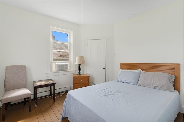 53 Warner St, Newport, RI 02840 - bedroom featuring light wood-type flooring, a baseboard radiator, and cooling unit