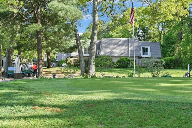 18 Caddy Rock Rd Unit C, North Kingstown, RI 02852 - view of grassy yard with view of wooded area