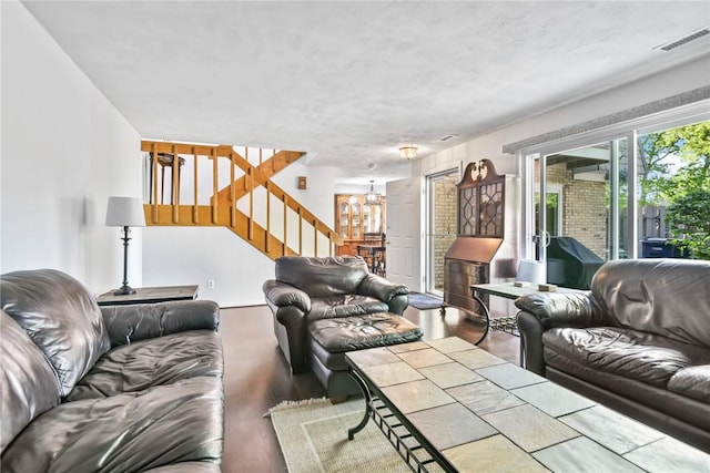 18 Caddy Rock Rd Unit C, North Kingstown, RI 02852 - living area featuring stairs, a chandelier, and wood finished floors
