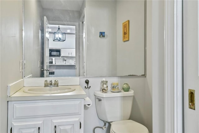 18 Caddy Rock Rd Unit C, North Kingstown, RI 02852 - half bath featuring vanity and toilet