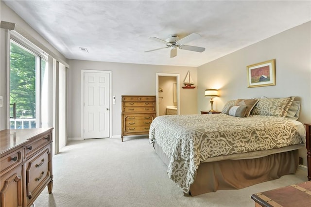 18 Caddy Rock Rd Unit C, North Kingstown, RI 02852 - bedroom featuring light carpet, baseboards, ensuite bathroom, and a ceiling fan