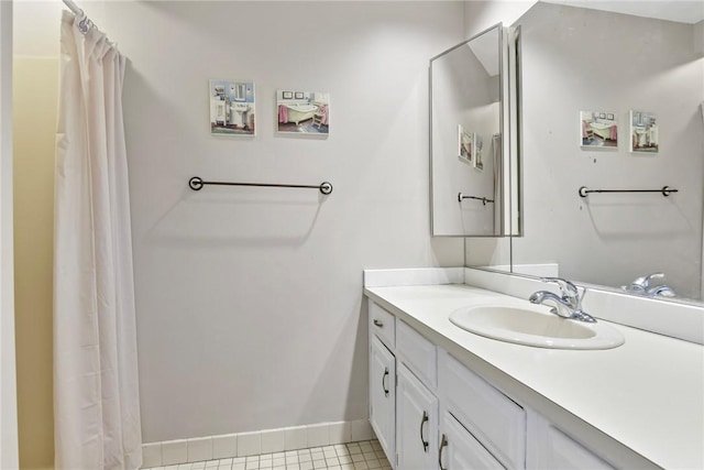 18 Caddy Rock Rd Unit C, North Kingstown, RI 02852 - full bath with vanity, baseboards, and a shower with shower curtain