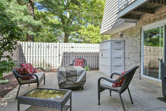 18 Caddy Rock Rd Unit C, North Kingstown, RI 02852 - fenced backyard with a patio area and an outdoor living space