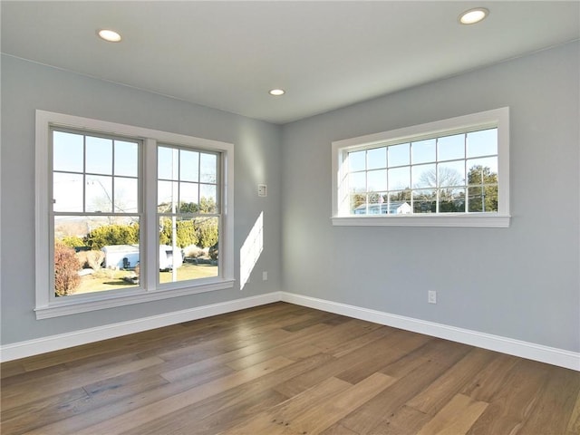 24 Seaspray Way, Little Compton, RI 02837 - unfurnished room with plenty of natural light, baseboards, dark wood finished floors, and recessed lighting