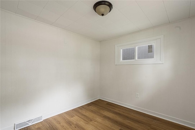 613 Prospect St, Woonsocket, RI 02895 - spare room with dark wood finished floors and baseboards