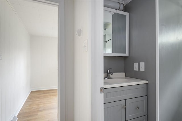 613 Prospect St, Woonsocket, RI 02895 - bathroom with vanity and wood finished floors