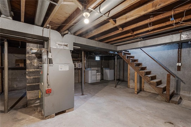 613 Prospect St, Woonsocket, RI 02895 - unfinished below grade area with washer and clothes dryer, stairs, and heating unit