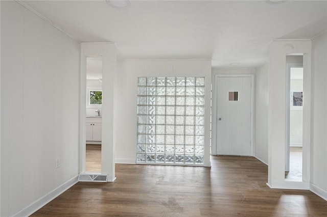 613 Prospect St, Woonsocket, RI 02895 - unfurnished room featuring wood finished floors, crown molding, and baseboards
