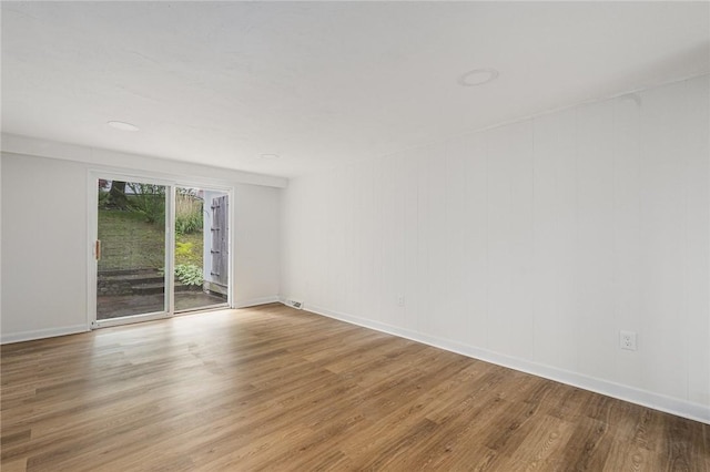 613 Prospect St, Woonsocket, RI 02895 - unfurnished room with wood finished floors and baseboards