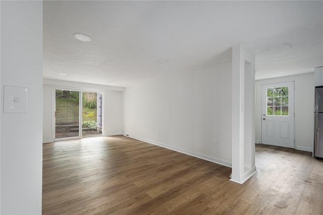 613 Prospect St, Woonsocket, RI 02895 - empty room with wood finished floors and baseboards