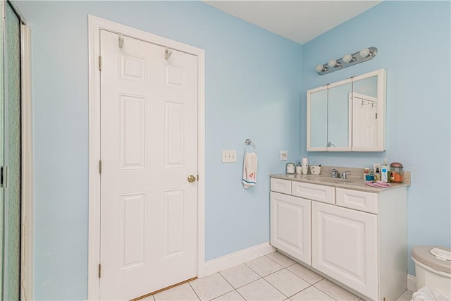187 Plainfield Pike, Scituate, RI 02857 - bathroom with vanity, toilet, tile patterned floors, and baseboards