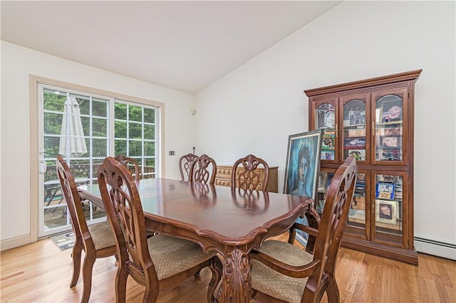 187 Plainfield Pike, Scituate, RI 02857 - dining room with vaulted ceiling, light wood finished floors, and baseboard heating