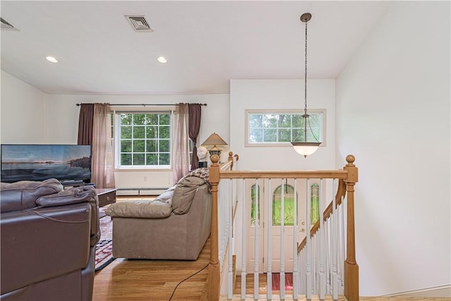 187 Plainfield Pike, Scituate, RI 02857 - living room featuring wood finished floors, recessed lighting, and baseboard heating