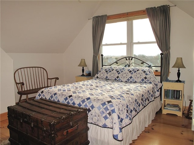 540 Off Center Rd, Block Island, RI 02807 - bedroom featuring wood finished floors and vaulted ceiling