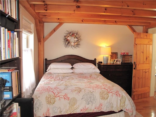 540 Off Center Rd, Block Island, RI 02807 - bedroom with wood finished floors and beamed ceiling