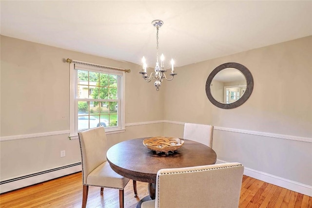 15 Lafayette Rd, Barrington, RI 02806 - dining room with a baseboard heating unit, a chandelier, light wood-type flooring, and baseboards