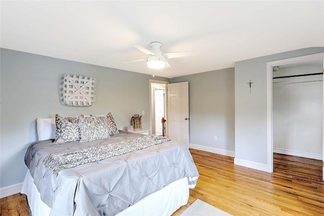 15 Lafayette Rd, Barrington, RI 02806 - bedroom with baseboards, light wood-style flooring, a closet, and a ceiling fan