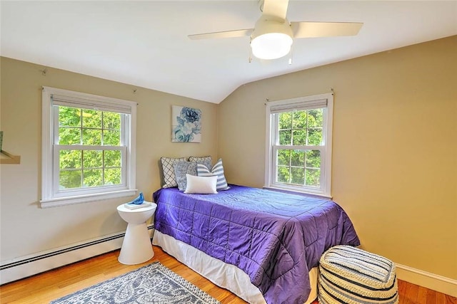 15 Lafayette Rd, Barrington, RI 02806 - bedroom featuring a baseboard radiator, wood finished floors, lofted ceiling, a ceiling fan, and baseboards