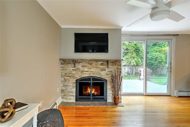 15 Lafayette Rd, Barrington, RI 02806 - living room with baseboard heating, crown molding, a fireplace, wood finished floors, and a ceiling fan