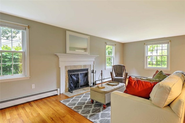 15 Lafayette Rd, Barrington, RI 02806 - living area with baseboard heating, healthy amount of natural light, and light wood-type flooring