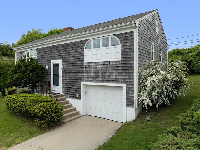 3 Ernest St, Newport, RI 02840 - view of front facade with a garage, a chimney, and driveway