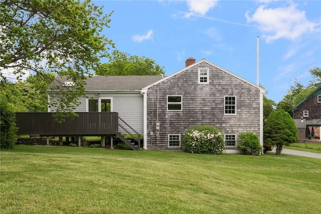 3 Ernest St, Newport, RI 02840 - rear view of property with a chimney, a lawn, a deck, and stairs