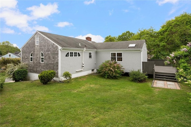 3 Ernest St, Newport, RI 02840 - rear view of property with a wooden deck, a lawn, and a chimney