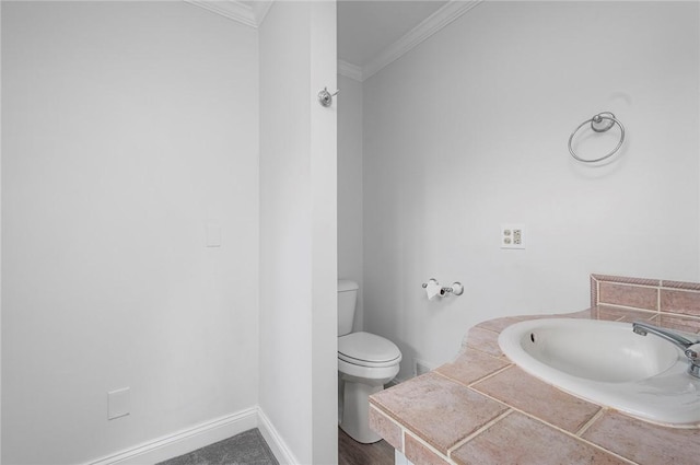 3 Ernest St, Newport, RI 02840 - half bath featuring crown molding, a sink, toilet, and baseboards