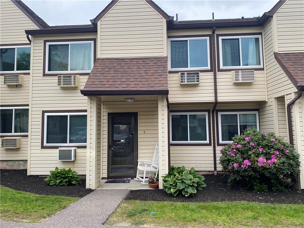 223 High St Unit S, Westerly, RI 02891 - view of property featuring cooling unit, roof with shingles, and an AC wall unit