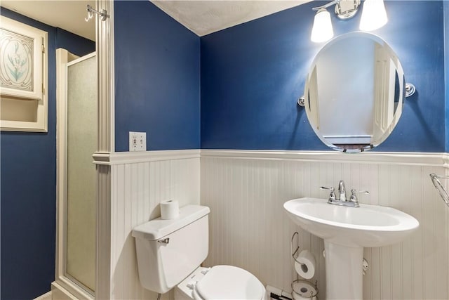 19 Bruce Dr, North Smithfield, RI 02896 - bathroom with wainscoting, a shower stall, toilet, and a sink