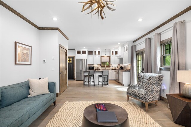 3 Gardenia Dr Unit M6, Richmond, RI 02898 - living room featuring ornamental molding, recessed lighting, and light wood-type flooring